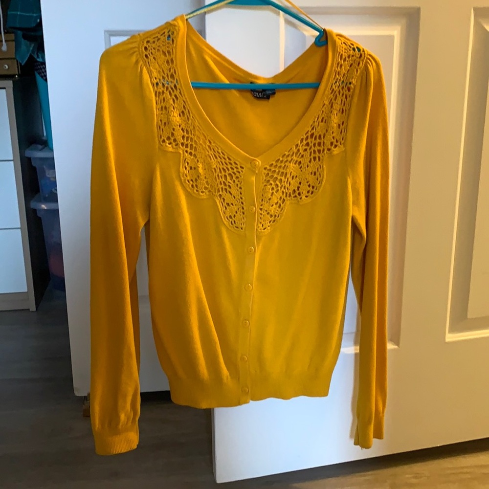 Mustard yellow cardigan with crocheted details